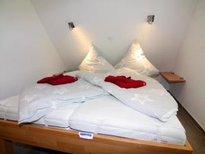 Ein Bett oder Betten in einem Zimmer der Unterkunft Semi-detached house, Zingst