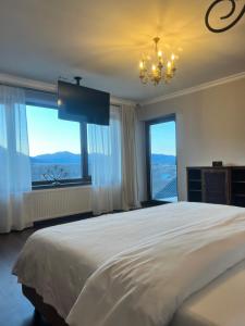 Postel nebo postele na pokoji v ubytování Crai Stone House