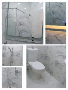 沙姆沙伊赫Suite Deluxe Vip Sharm El Sheik的一张四幅画合在一起的带卫生间的浴室