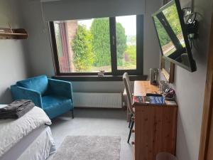 TV a/nebo společenská místnost v ubytování Black Isle View
