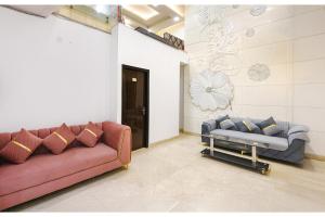Posezení v ubytování FabHotel Golden Key Inn Near Rajouri Garden + 23 fotografií
