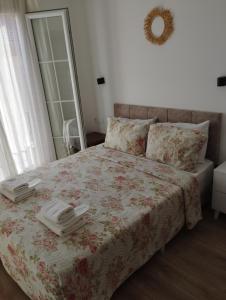 A bed or beds in a room at Adil Pansiyon