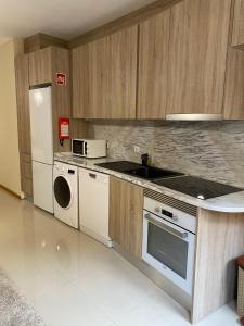 Η κουζίνα ή μικρή κουζίνα στο Trilhos do Diabo, T1