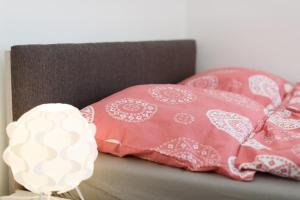 Łóżko lub łóżka w pokoju w obiekcie Vienna City Apartment Kempelengasse