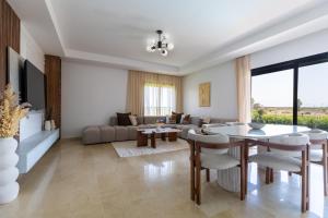 Posezení v ubytování Élégance et confort 3 chambre sur le golf de Noria