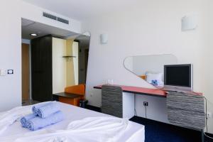 Postel nebo postele na pokoji v ubytování APOLONIS hotel + 37 fotografií