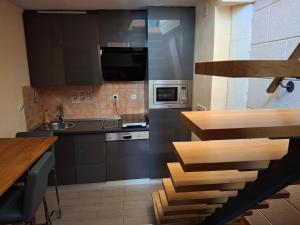 Η κουζίνα ή μικρή κουζίνα στο Apartmani More Luxury apartment with whirpool and terace 50 m2
