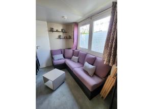 O zonă de relaxare la Mobil-home Clim, TV, LL Camping LA CARABASSE 4 étoiles - MH-A013