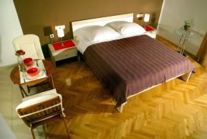 Postel nebo postele na pokoji v ubytování Apartments Perina