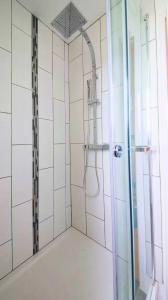 Ένα μπάνιο στο Appart avec 3 chambres et Jardin