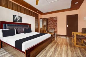 Postel nebo postele na pokoji v ubytování Hotel O Rajbagh