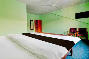 Postel nebo postele na pokoji v ubytování Hotel O Rajbagh