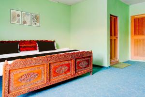 Postel nebo postele na pokoji v ubytování Hotel O Rajbagh