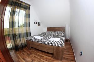 Posteľ alebo postele v izbe v ubytovaní Balm Apartman