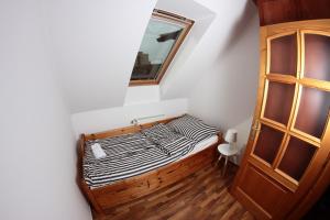 מיטה או מיטות בחדר ב-Balm Apartman