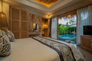 Piscina di The Macaw Ubud Green Uma Villa o nelle vicinanze