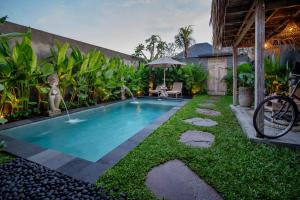 Piscina di The Macaw Ubud Green Uma Villa o nelle vicinanze