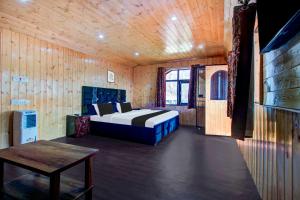 Postel nebo postele na pokoji v ubytování Hotel O Brein Nishat