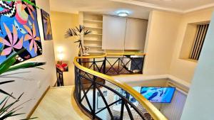 Televízia a/alebo spoločenská miestnosť v ubytovaní Flat Apart hotel c/dois quartos em Moema SP