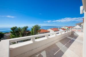 a balcony with a view of a city at Vila Chiara in Makarska