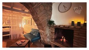 Posezení v ubytování Centralissimo LOFT con camino romantico