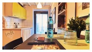 Kuchyň nebo kuchyňský kout v ubytování Centralissimo LOFT con camino romantico