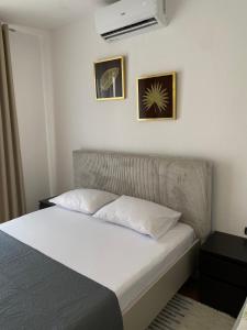 Postel nebo postele na pokoji v ubytování Bey’s GuestHouse