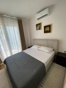 Postel nebo postele na pokoji v ubytování Bey’s GuestHouse