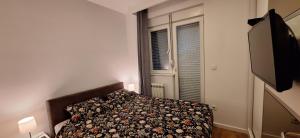 Postel nebo postele na pokoji v ubytování Miletić Lux