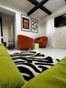 Posezení v ubytování Studio apartman Boogie + 25 fotografií