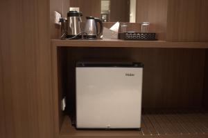 Kuchyň nebo kuchyňský kout v ubytování Hotel Sai Sanidhya