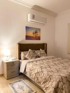 En eller flere senge i et værelse på شقق راقية بأثاث حديث وراقي 1