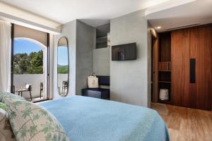 TV a/nebo společenská místnost v ubytování Hotel delle Rose a Luxury Boutique Hotel