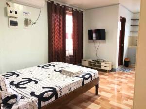 Postel nebo postele na pokoji v ubytování ZM Residence