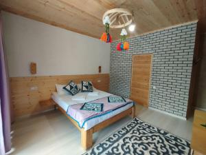 Voodi või voodid majutusasutuse Guest House Jekshen toas