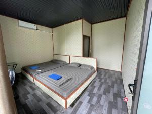 Un pat sau paturi într-o cameră la MOTEL Nguyễn Quang - Trung tâm xã Du Già - Yên Minh - Hà Giang