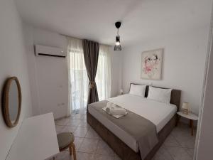 Amelia Seaview Apartments & Studios客房内的一张或多张床位