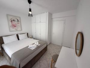 Amelia Seaview Apartments & Studios客房内的一张或多张床位