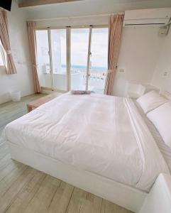 Letto o letti in una camera di White&Light B&B