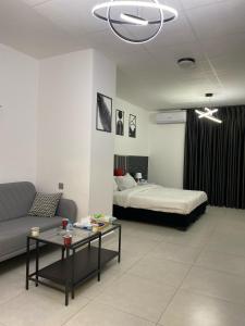 Postel nebo postele na pokoji v ubytování Eden Hotel
