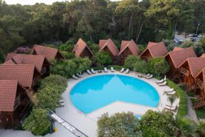 an aerial view of a resort with a swimming pool at Woodline Hotel in Kemer +29 photos