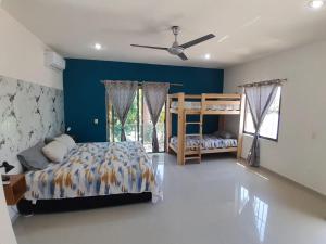 En eller flere senge i et værelse på Casa los fundadores 24 7 Security Private Pool Service Included