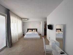 Amelia Seaview Apartments & Studios客房内的一张或多张床位
