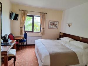 Postel nebo postele na pokoji v ubytování Corthna Lodge