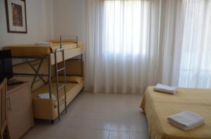 Postel nebo postele na pokoji v ubytování Hotel Caesar