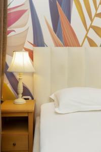 Le Palazzine Hotel客房内的一张或多张床位