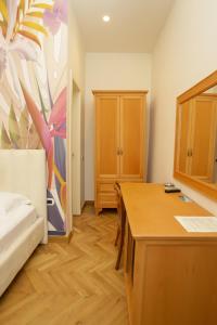 Le Palazzine Hotel客房内的一张或多张床位