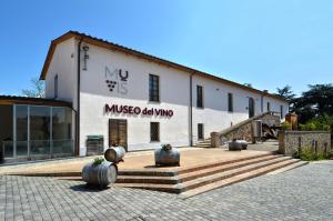 a building with pumpkins in front of it at Domus Librande in Castiglione in Teverina +5 photos