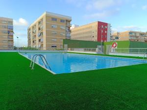 Bazén v ubytování Apartamento playa nebo v jeho okolí