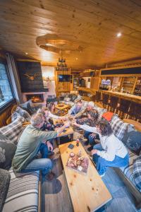 Posezení v ubytování Chalet Hôtel Les Airelles